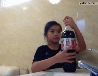 1372354474_girl_opens_diet_coke_with_mentos.gif