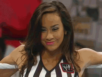 AJ-Enjoying-The-Show-As-A-Referee-On-WWE.gif