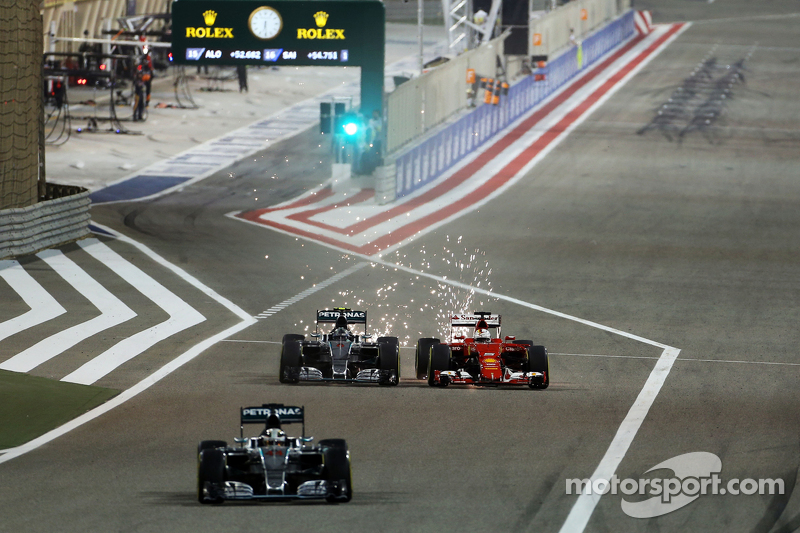 f1-bahrain-gp-2015-lewis-hamilton-mercedes-amg-f1-w06-leads-out-of-the-pit-as-nico-rosberg.jpg
