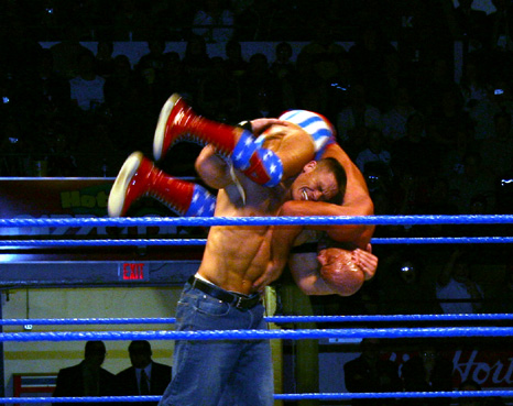 John_Cena_hits_the_F-U_on_Kurt_Angle.jpg