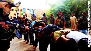 140615132726-isis-photos-mass-killing-iraqi-soldiers-story-body.jpg
