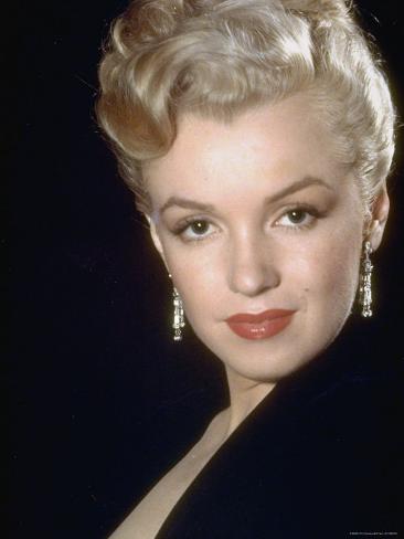 ed-clark-actress-marilyn-monroe-wearing-dangling-rhinestone-earrings-with-her-hair-up.jpg