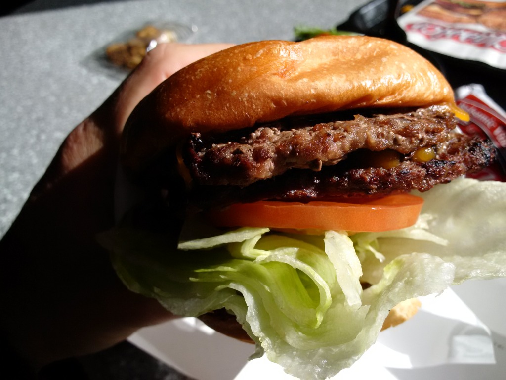 carls-jr-all-natural-burger-in-hand.jpg