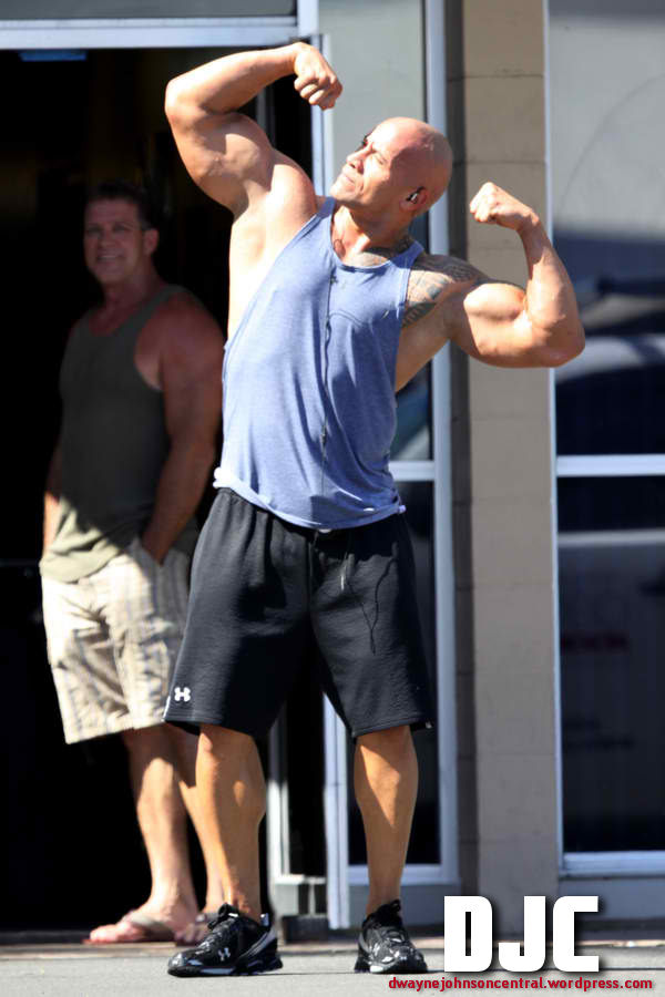 dwayne-johnson-flexing-his-massive-biceps-hawaii.jpg
