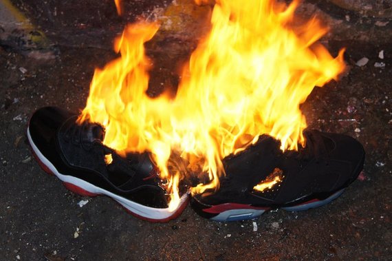 Burning fake VI & XI...hope he was sure they were fakes : ))) | NikeTalk