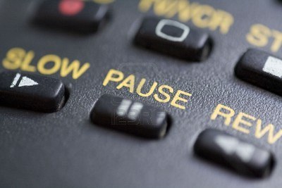 3080279-a-close-up-of-the-pause-button-on-a-remote-control.jpg