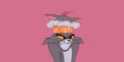 Animated GIF from the Tom and Jerry cartoon showing an angry Tom the cat with steam coming out of his head.