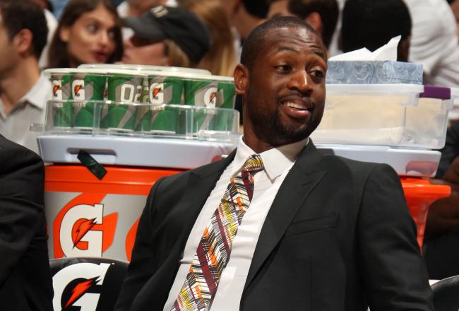 hi-res-450665169-dwyane-wade-of-the-miami-heat-smiles-from-the-bench_crop_north.jpg