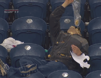 Stuffing-a-Popcorn-Bag-Into-Your-Mouth-At-a-Baseball-Game.gif