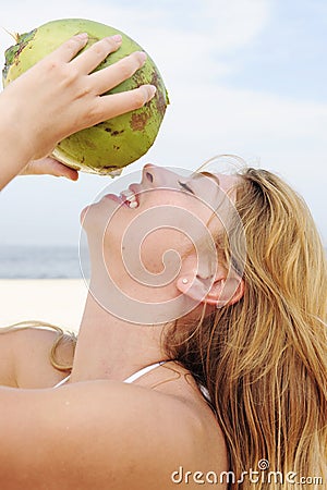 thirsty-woman-drinking-coconut-water-close-up-14087889.jpg