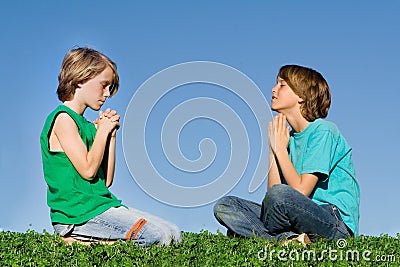 prayer-group-children-praying-thumb4553514.jpg