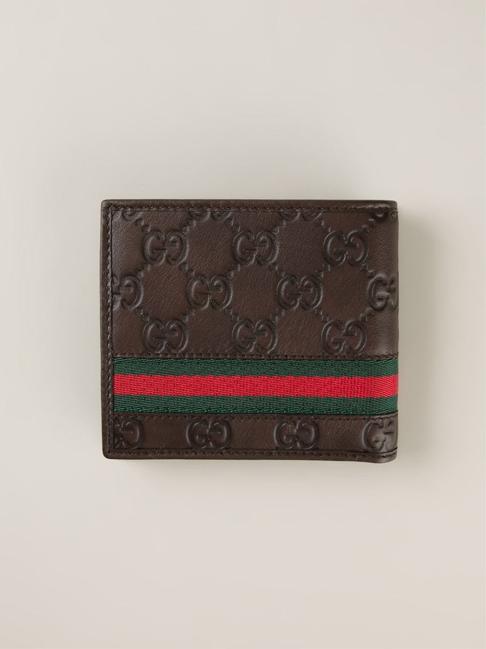 gucci-brown-logo-embossed-wallet-product-1-27241541-1-785468987-normal.jpeg