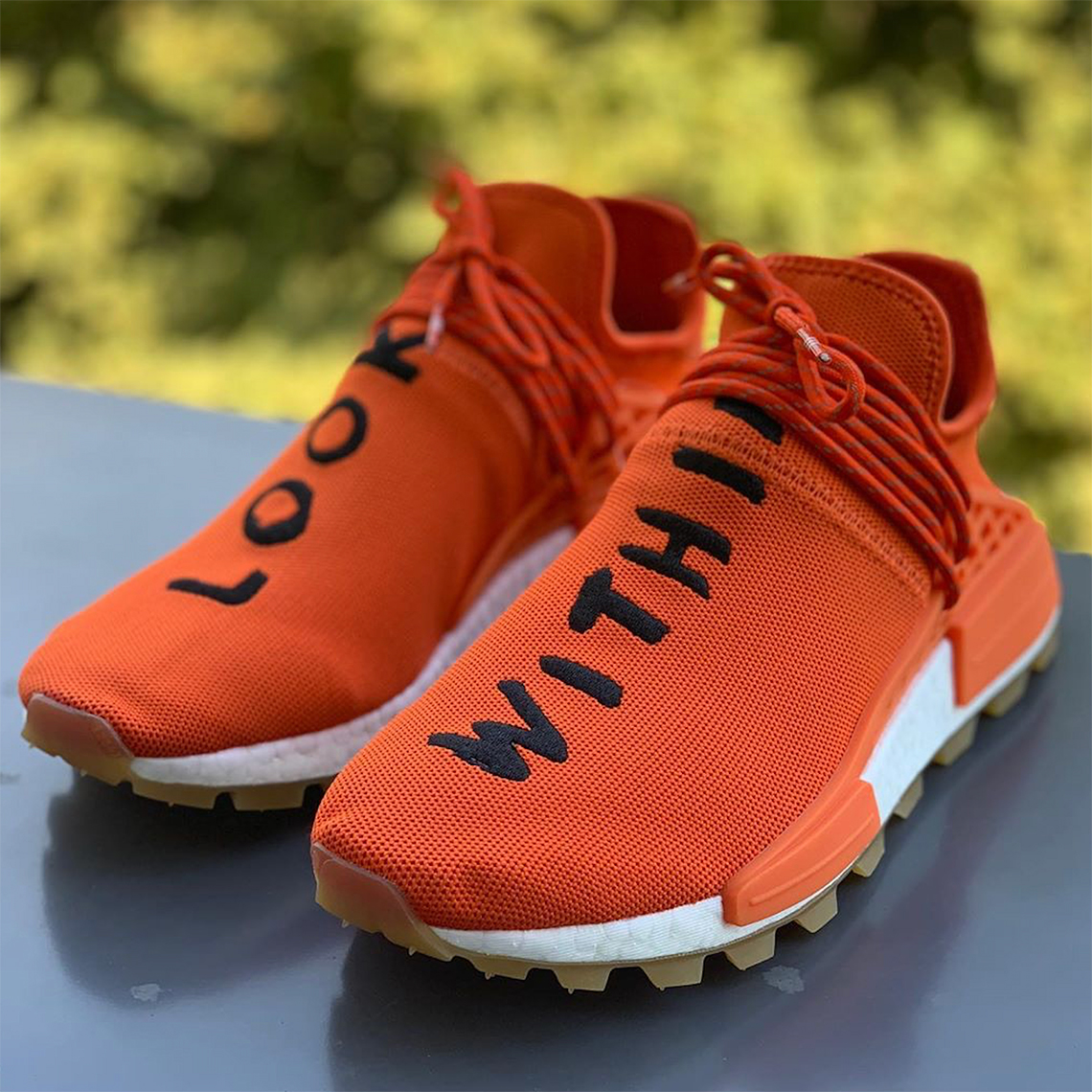 pharrell-adidas-nmd-hu-look-within-orange-4.jpg